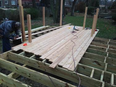 Cedar decking being installed on deck in Darien IL 2013