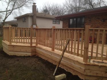 Nearly completed Darien cedar deck 2013. Deck builder A-Affordable Decks of Lombard Illinois