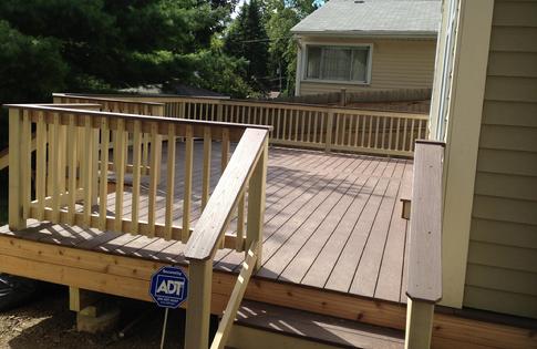 Glen Ellyn IL. deck project 2013. Cedar railing (stained) with an Azek pvc floor. A-Affordable Decks of Lombard