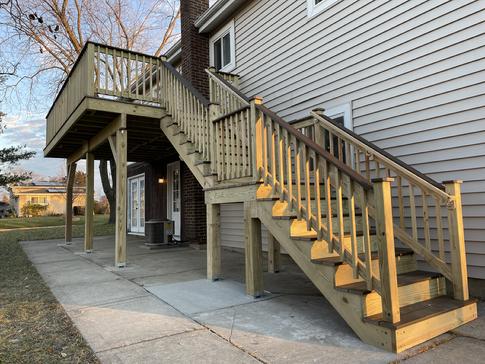 Elmhurst IL 2021 second story deck. Trex decking with wood railings. A-Affordable Decks